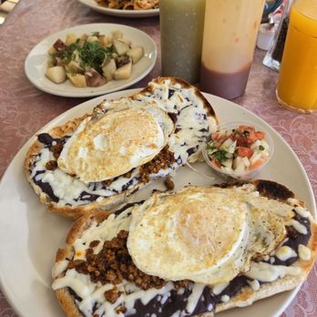 Buenos Días Cafe - Molletes con chorizo 2 over medium eggs - Breakfast & Brunch Near Me - Gulf Breeze, Florida Buenos Días Cafe - Molletes con chorizo 2 over medium eggs - Breakfast & Brunch Near Me - Gulf Breeze, Florida