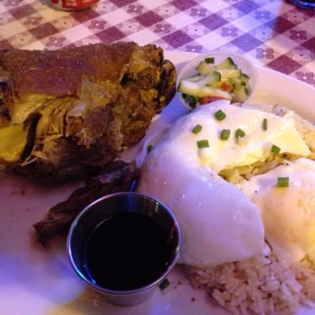 Tapsilog Bistro - Crispy pata with garlic fried rice and a fried egg on it. - Filipino Near Me - Campbell, California