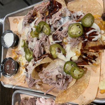 Dukes BBQ Shack - Pulled Pork Nachos. Loaded with meat and toppings, best bbq restaurant nachos to date! Gotta try them! - Barbeque Near Me - Wentzville, Missouri