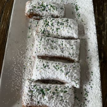 Monty's on the Square - King Cake Beignets - Cajun/Creole Near Me - New Orleans, Louisiana Monty's on the Square - King Cake Beignets - Cajun/Creole Near Me - New Orleans, Louisiana