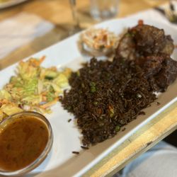 Grill Shack & Tiki Bar - Griot with diri djon djon (Black rice)
