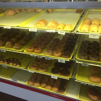 Donut Palace - a variety of donuts in a display case - Donuts Near Me - Monroe, Louisiana