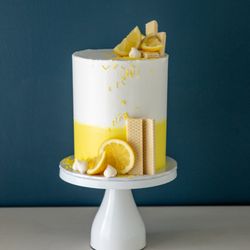 Elegant Temptations - Bright, zesty, and oh-so-refreshing! This lemon cake bursts with citrusy cheer, wafer crunch, and sunny vibes in every bite.