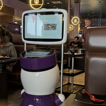 K-BBQ & Hot Pot - a purple and white robot - Korean Near Me - Amherst, New York K-BBQ & Hot Pot - a purple and white robot - Korean Near Me - Amherst, New York