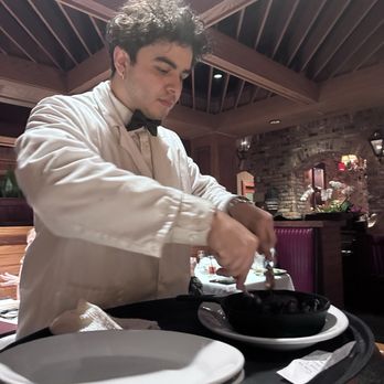 Vito's Chop House - Staff serving the Waygu filet - Italian Near Me - Orlando, Florida