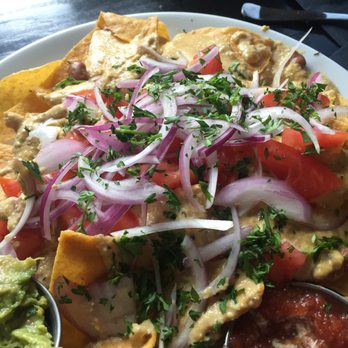 Cascadia Public House - Cashew queso nachos - Gastropubs Near Me - Spokane, Washington Cascadia Public House - Cashew queso nachos - Gastropubs Near Me - Spokane, Washington