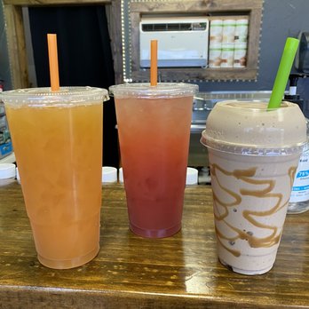 Rockin’ Nutrition - three drinks on a counter - Juice Bars & Smoothies Near Me - Pearl, Mississippi Rockin’ Nutrition - three drinks on a counter - Juice Bars & Smoothies Near Me - Pearl, Mississippi