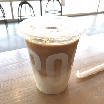 Rosso Coffee Roasters - Iced latte with oat milk (alternative milks cost extra) - $6.45 after tax - Coffee & Tea Near Me - Calgary, Alberta