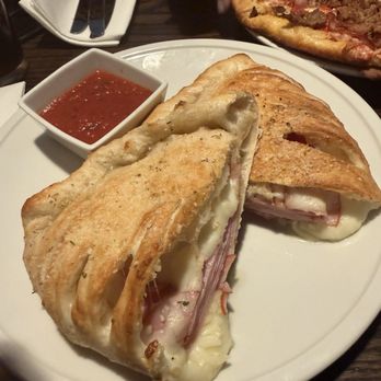 Z'Abbracci - Calzone - Pizza Near Me - Castle Rock, Colorado Z'Abbracci - Calzone - Pizza Near Me - Castle Rock, Colorado