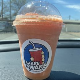 a drink in a plastic cup a drink in a plastic cup