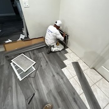 You Name It Construction - a man laying on the floor - General Contractors Near Me You Name It Construction - a man laying on the floor - General Contractors Near Me