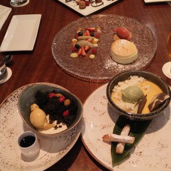 Morimoto - Fiery Choclate Tart (top), Chilled Cheesecake Souffle (mid), Tofu Mousse (left), Coconut Mango (right) - Japanese Near Me - Las Vegas, Nevada Morimoto - Fiery Choclate Tart (top), Chilled Cheesecake Souffle (mid), Tofu Mousse (left), Coconut Mango (right) - Japanese Near Me - Las Vegas, Nevada