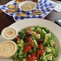 Hummus with pita bread and salad Hummus with pita bread and salad