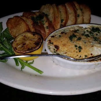 Morton's The Steakhouse - artichoke dip, notice how dark with full on flash the table looks - Steakhouses Near Me - Honolulu, Hawaii