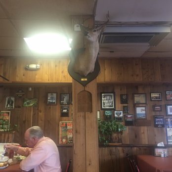 Kings BBQ - Deer head watching you eat. - Barbeque Near Me - La Porte, Texas