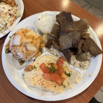 Chicken Maison - Gyro plate ($17.90) with spicy potato salad and hummus - Mediterranean Near Me - Santa Ana, California Chicken Maison - Gyro plate ($17.90) with spicy potato salad and hummus - Mediterranean Near Me - Santa Ana, California