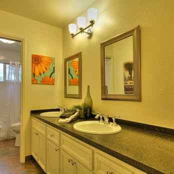 Poplar Builders - Simple bathroom refresh included new tub & surround, new granite & fixtures, and more modern mirrors and lights. - General Contractors Near Me Poplar Builders - Simple bathroom refresh included new tub & surround, new granite & fixtures, and more modern mirrors and lights. - General Contractors Near Me