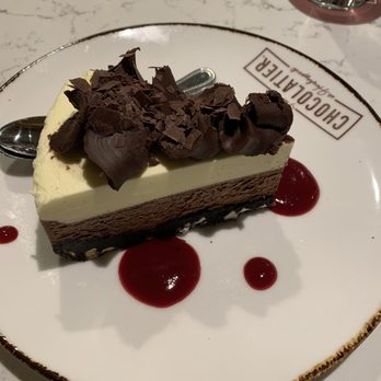 The Chocolatier - Brownie cheese cake - New American Near Me - Hershey, Pennsylvania The Chocolatier - Brownie cheese cake - New American Near Me - Hershey, Pennsylvania