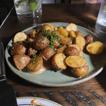 AltaToro - Potatoes coming with burger - Latin American Near Me - Atlanta, Georgia AltaToro - Potatoes coming with burger - Latin American Near Me - Atlanta, Georgia