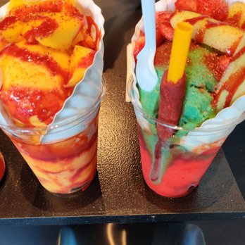 Frozen Monkey - Loaded mango ice topped with mango pieces and loaded cucumber and watermelon ice topped with strawberry, cucumber, and mango pieces - Ice Cream & Frozen Yogurt Near Me - Lawton, Oklahoma