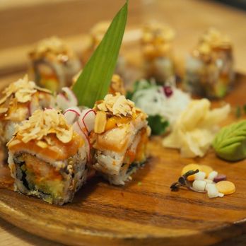 Rice N Roll Bistro - Get a 'MUNCHIE MUNCHIE' maki - Crabmeat tempura with seared Salmon plus roasted almond - Sushi Bars Near Me - Milwaukee, Wisconsin Rice N Roll Bistro - Get a 'MUNCHIE MUNCHIE' maki - Crabmeat tempura with seared Salmon plus roasted almond - Sushi Bars Near Me - Milwaukee, Wisconsin