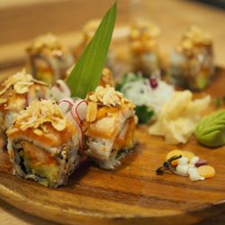 Rice N Roll Bistro - Get a 'MUNCHIE MUNCHIE' maki - Crabmeat tempura with seared Salmon plus roasted almond