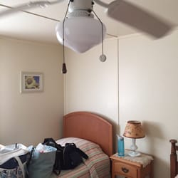 Holly Haven - Twin bed (also in our room) with ceiling fan and lamp