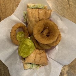 Pass Key Restaurant - Original grinder with onion rings.  Pass Key Special with Cheese.