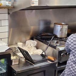 The Eatery The Blend - She takes the fresh dough, presses them 8nto tortillas, then puts them on the griddle