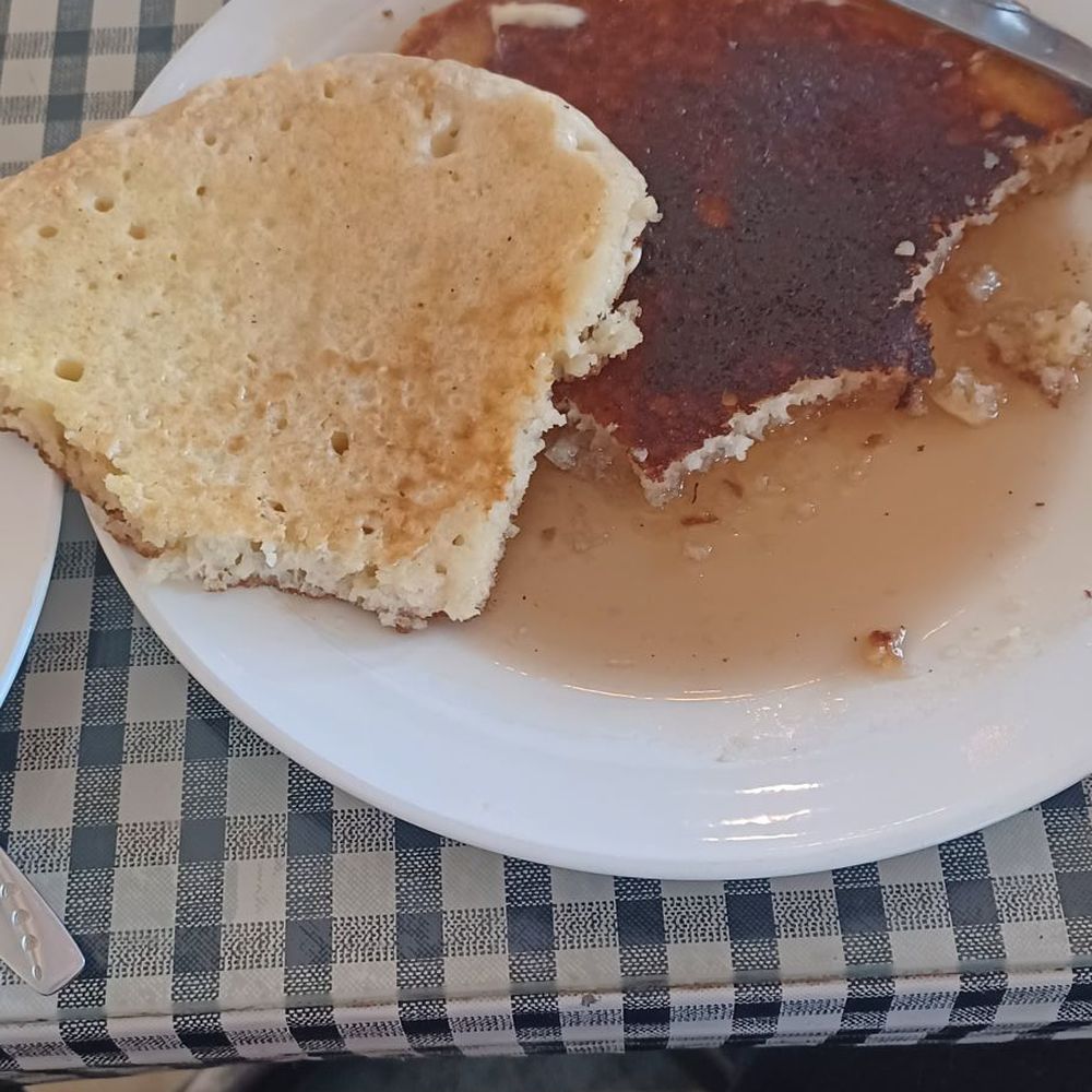 Day Break Cafe - Half crunchy burnt half raw pancakes. This is what they both looked like equally. - Breakfast & Brunch Near Me - Penn Valley, California Day Break Cafe - Half crunchy burnt half raw pancakes. This is what they both looked like equally. - Breakfast & Brunch Near Me - Penn Valley, California