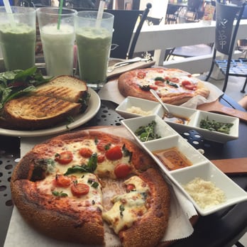 Urth Caffe - Margarita Pizza with spicy oil, parmesan cheese, and fresh oregano - Coffee & Tea Near Me - Laguna Beach, California Urth Caffe - Margarita Pizza with spicy oil, parmesan cheese, and fresh oregano - Coffee & Tea Near Me - Laguna Beach, California