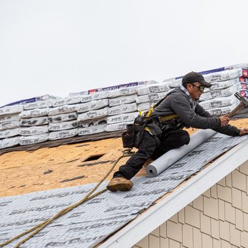 Holladay Grace Roofing - a man working on a roof - Roofing Near Me - Colorado Springs, Colorado Holladay Grace Roofing - a man working on a roof - Roofing Near Me - Colorado Springs, Colorado