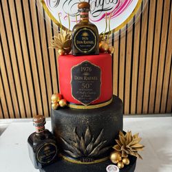 Custom tequila cake with tequila bottles. Marble cake with Nutella and vanilla cream layers. So moist and yummy!!!