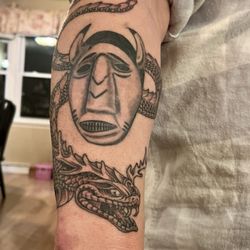 Artrageous Ink - Buffalo mask and Uktena tattoos by Brady Buckman