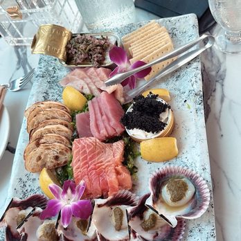 FIVE on the Hill - Westcoast Sea-Cuterie Board with hamachi, tuna, salmon, boquerones (vinegar-macerated anchovies) scallop, caviar, seaweed salad. - Cocktail Bars Near Me - Universal City, California FIVE on the Hill - Westcoast Sea-Cuterie Board with hamachi, tuna, salmon, boquerones (vinegar-macerated anchovies) scallop, caviar, seaweed salad. - Cocktail Bars Near Me - Universal City, California