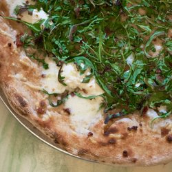 The Upper Crust - The Arugula, Includes ricotta cheese, fresh mozzarella cheese, parmesan cheese, caramelized onion, and tender Italian guanciale.