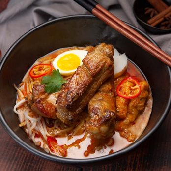 The Hidden Bistro - Laksa is a rich and spicy coconut soup that goes well with the super tender pork ribs! - Vietnamese Near Me - San Francisco, California The Hidden Bistro - Laksa is a rich and spicy coconut soup that goes well with the super tender pork ribs! - Vietnamese Near Me - San Francisco, California