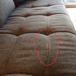 Jose Goncalves - Frayed couch cushion (before repair)