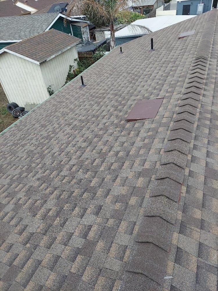 Slide of ML Gutters & Roofing