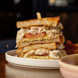 Whiskey Cake Jacksonville - Chicken & Cheese Melt:
roasted chicken, peppered bacon, fontina cheese, tomato, lettuce, avocado, roasted shallot mayo, sourdough