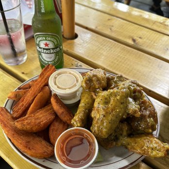 Buff's Pub - Lemon pepper wings and sweet potato fries - American Near Me - Newton, Massachusetts Buff's Pub - Lemon pepper wings and sweet potato fries - American Near Me - Newton, Massachusetts