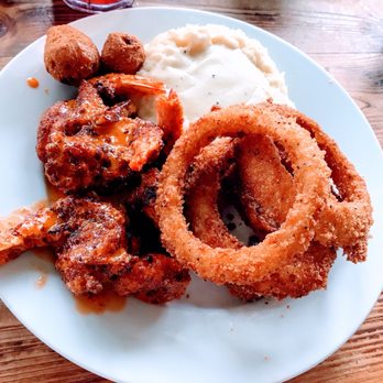 Asiel's Restaurant - Shrimp Bang Bang w/ mashed potatoes, onion rings & hush puppies - New American Near Me - Lake Jackson, Texas Asiel's Restaurant - Shrimp Bang Bang w/ mashed potatoes, onion rings & hush puppies - New American Near Me - Lake Jackson, Texas