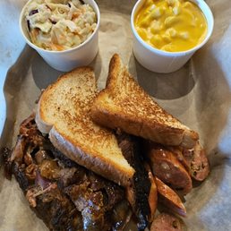 Mac n cheese,  cabbage slaw,  Texas toast,  ribs,  sausage,  brisket