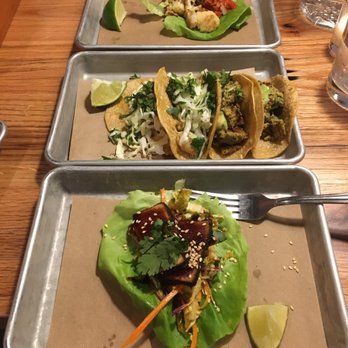 Bartaco Hilldale - Tuna taco (foreground), crispy shrimp and chicken chorizo tacos (middle), cauliflower taco (background) - Tacos Near Me - Madison, Wisconsin