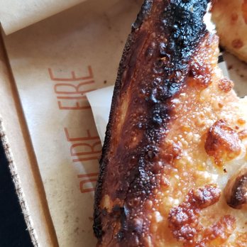 Blaze Pizza - Another view of the burnt piece - Salad Near Me - Rialto, California Blaze Pizza - Another view of the burnt piece - Salad Near Me - Rialto, California