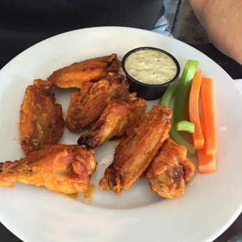 The Trestle - Buffalo Wings seemed to have been cooked a bit too long but the flavor of the sauce was great. Celery was a bit curled and cooked. - Cocktail Bars Near Me - Astoria, New York The Trestle - Buffalo Wings seemed to have been cooked a bit too long but the flavor of the sauce was great. Celery was a bit curled and cooked. - Cocktail Bars Near Me - Astoria, New York
