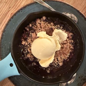 Farm Table - The cherry cobbler. Hot skillet! - New American Near Me - Wake Forest, North Carolina Farm Table - The cherry cobbler. Hot skillet! - New American Near Me - Wake Forest, North Carolina