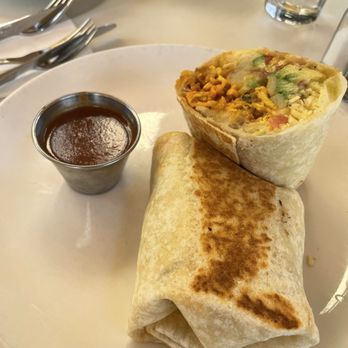 Poached Neighborhood Kitchen - Breakfast Burrito with chorizo sausage bacon egg tomato pico hash browns white cheddar serrano aioli salsa roja and added avocado - Breakfast & Brunch Near Me - Downey, California Poached Neighborhood Kitchen - Breakfast Burrito with chorizo sausage bacon egg tomato pico hash browns white cheddar serrano aioli salsa roja and added avocado - Breakfast & Brunch Near Me - Downey, California