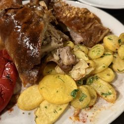 Tagoror - Cochinillo al horno--the slow-roasted pork leg and ribs they only serve on weekends and holidays