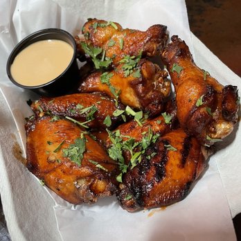 Werewolf - Grilled garlic ginger wings (sticky is an extra $1) - Breakfast & Brunch Near Me - San Diego, California Werewolf - Grilled garlic ginger wings (sticky is an extra $1) - Breakfast & Brunch Near Me - San Diego, California